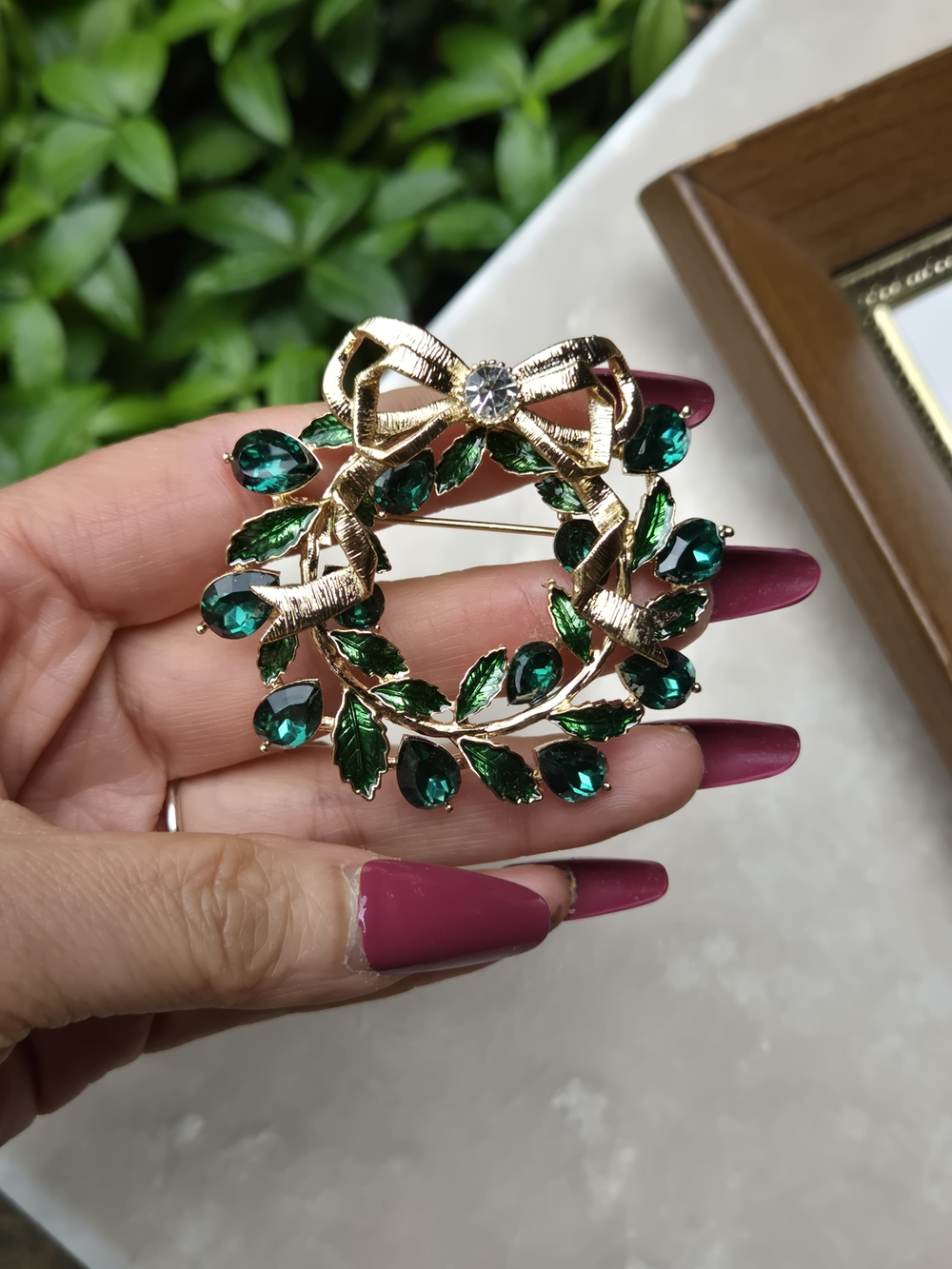 Napier Gold Tone Wreath Brooch with Emerald Green Stones